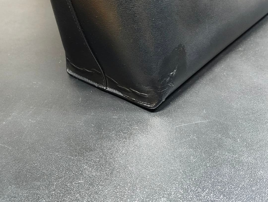 サン・ローラン　パンチングトートバッグ　黒