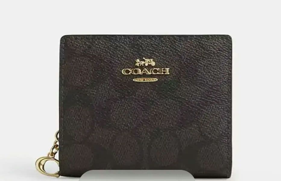 COACH スナップ ウォレット・シグネチャーキャンバス