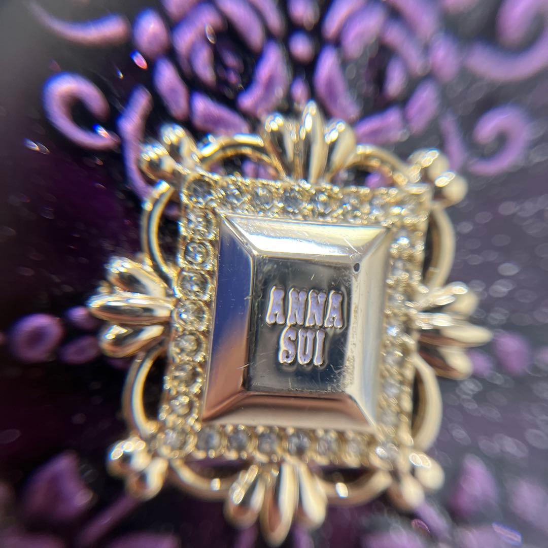 【人気モデル‼︎】ANNA SUI ルーミー　二つ折り財布　薔薇型押し　パープル