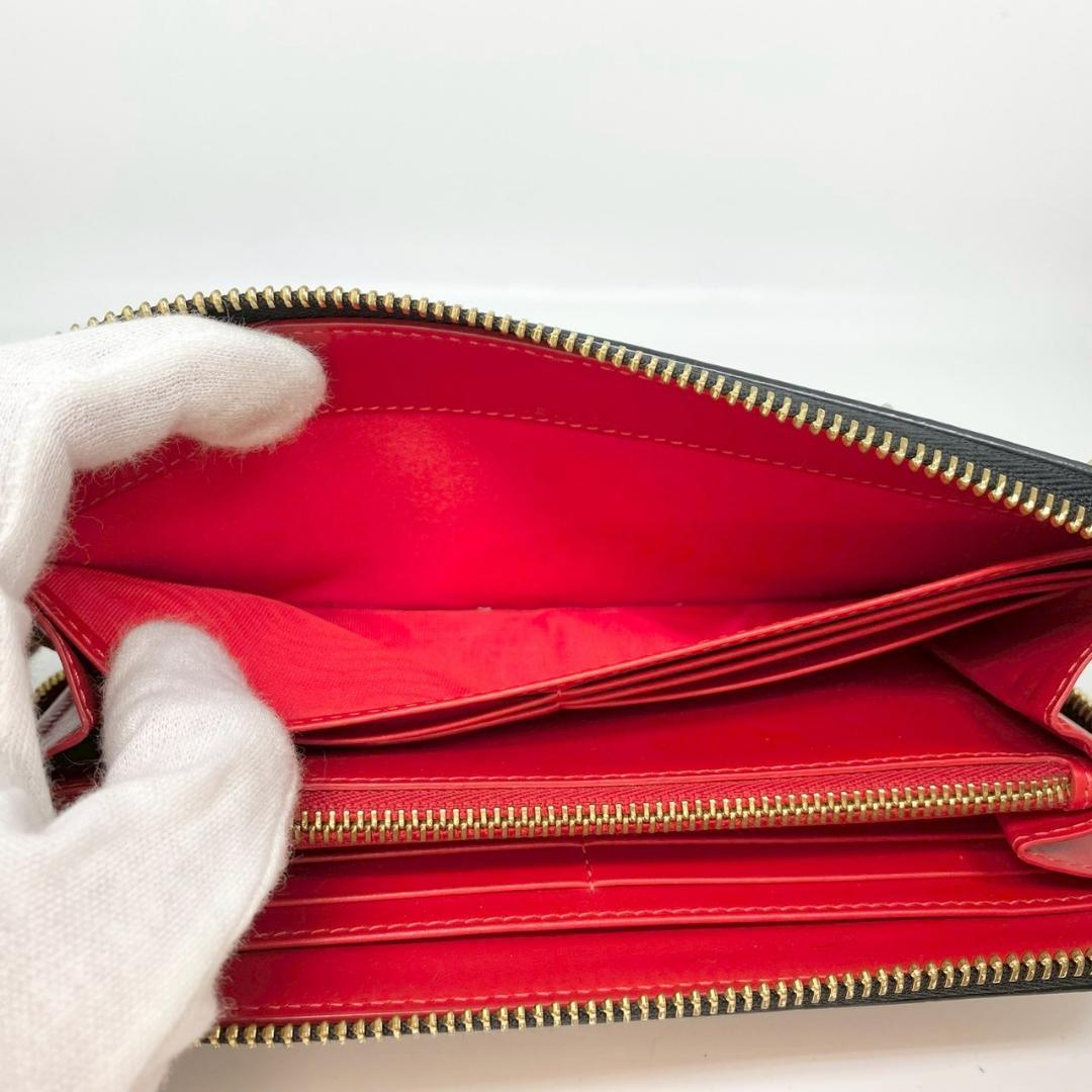 【CHRISTIAN LOUBOUTIN】 ラウンドジッピー　長財布　スタッズ