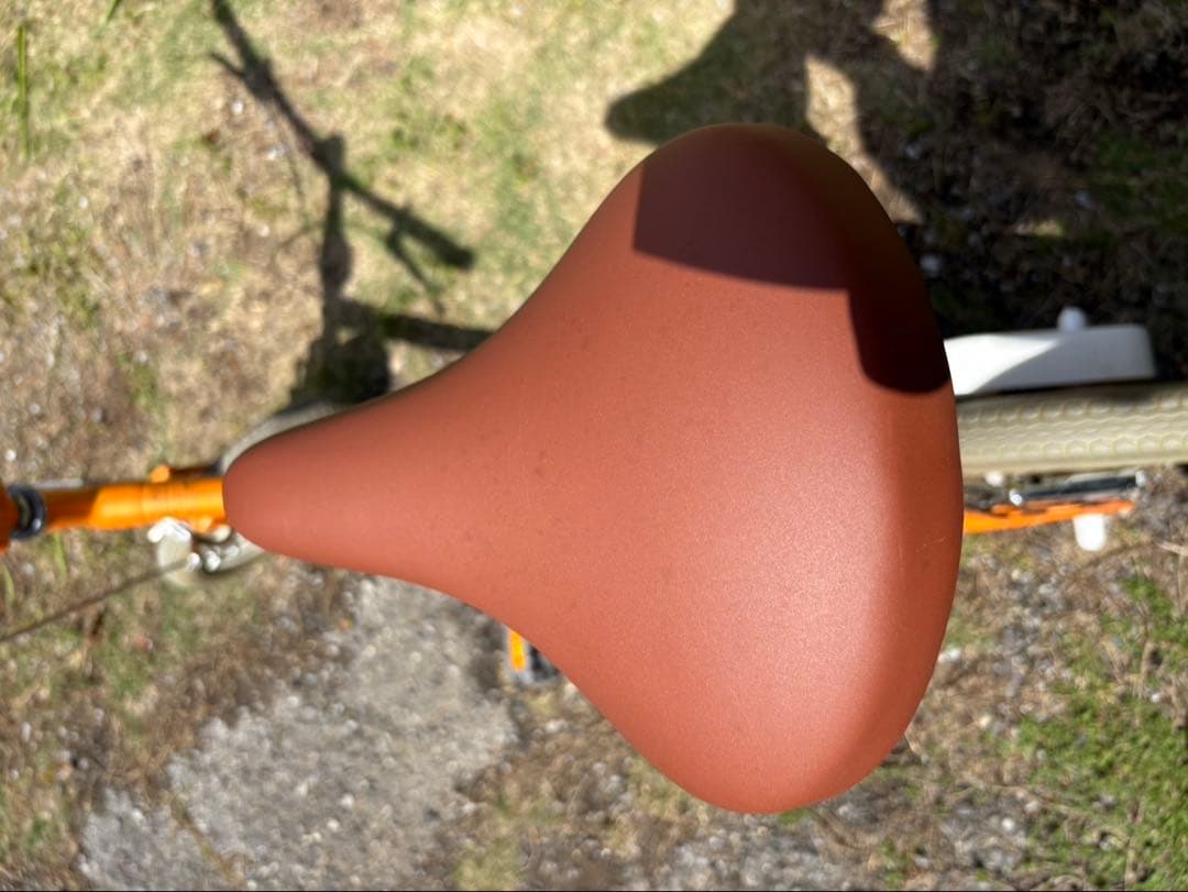 オレンジ色折りたたみ自転車（ナショナル）