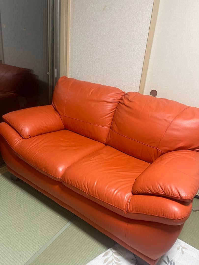 オレンジレザーソファ クッション付き