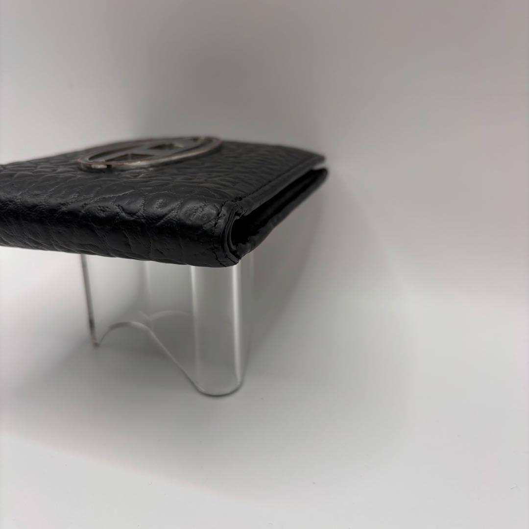 DIESEL 二つ折り財布　ブラック　型押し　D ロゴ　エンボス　シルバー