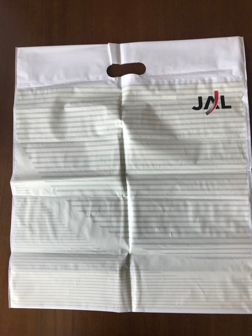 貴重　新品未使用　JALエプロン旧ロゴ入り　飛行機バッジ絵はがきなど付き　1点物