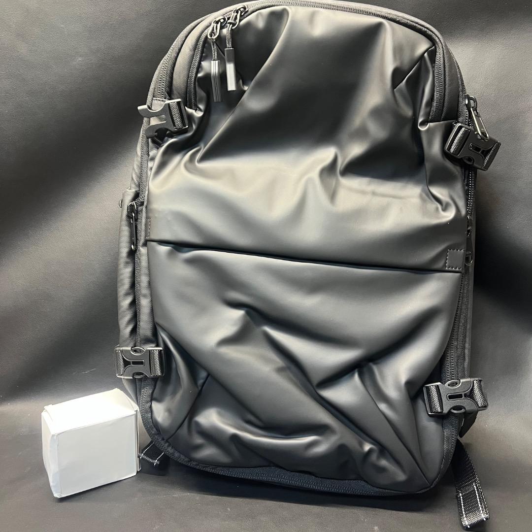 〇Of65 未使用 真空圧縮 バックパック トラベルバッグ ブラック