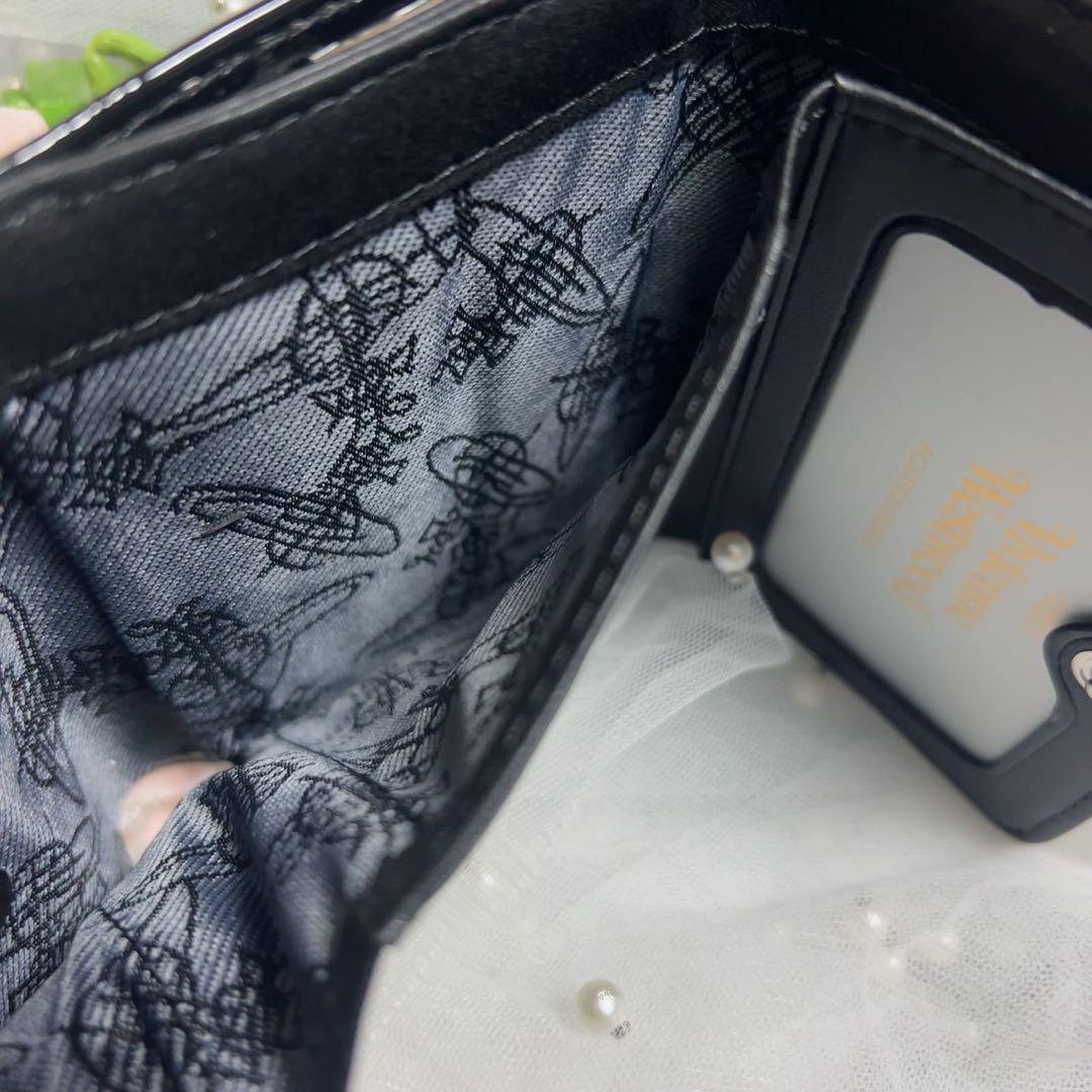 VivienneWestwoodエンボス加工の黒い三つ折り財布