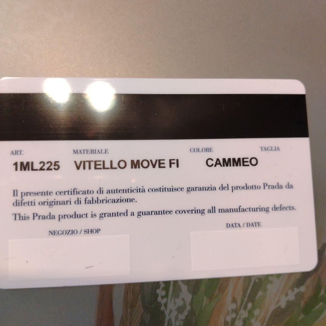 PRADA 二つ折り財布 リボン　ピンクベージュ