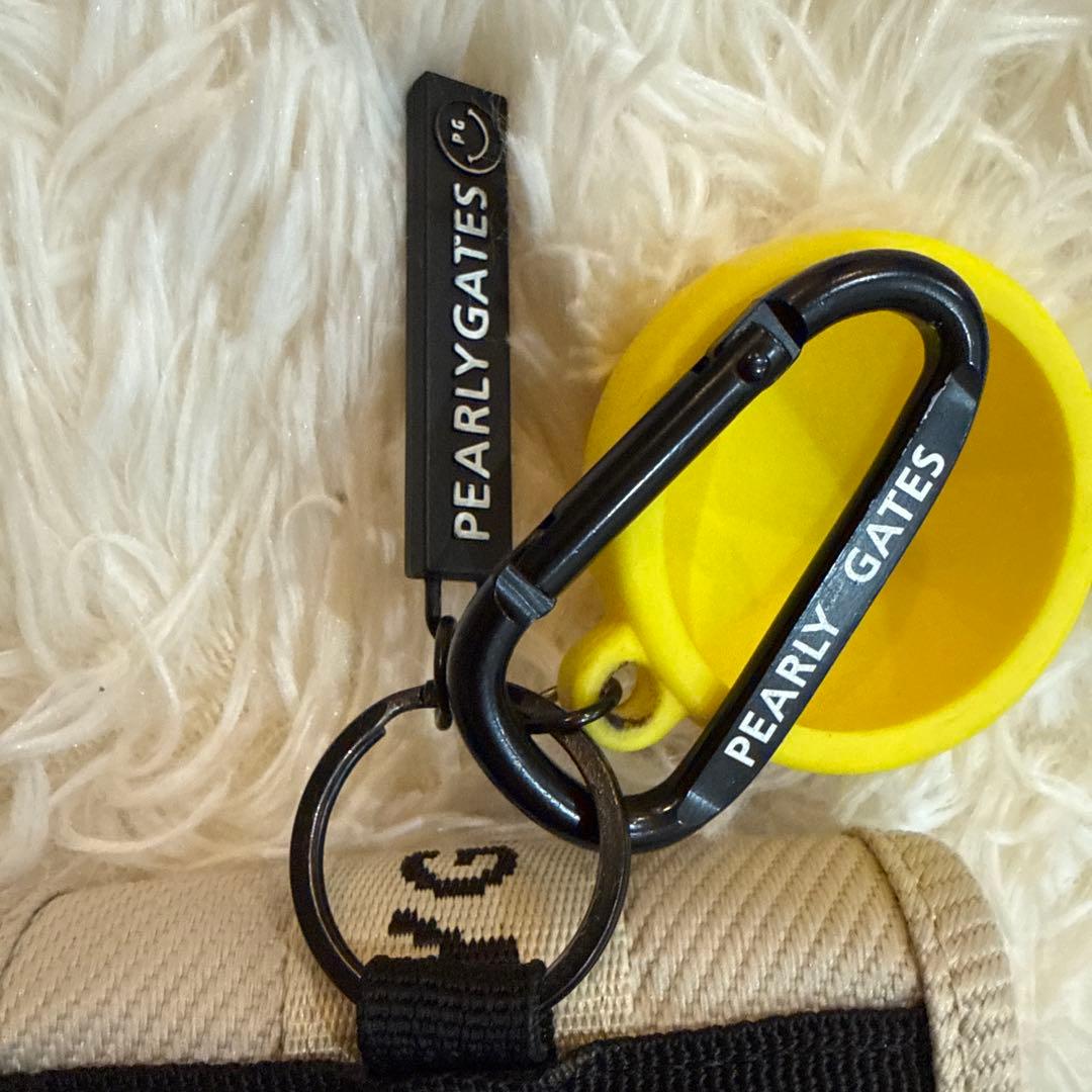 PEARLY GATES 距離計ケース スマイリーチャーム付き