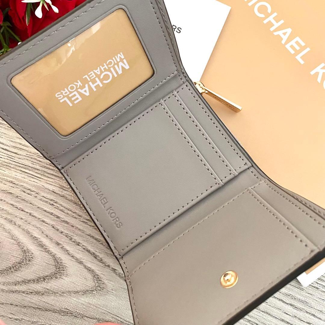 《新品》MICHAEL KORS 折り財布　ホワイト　シグネチャー　折り財布