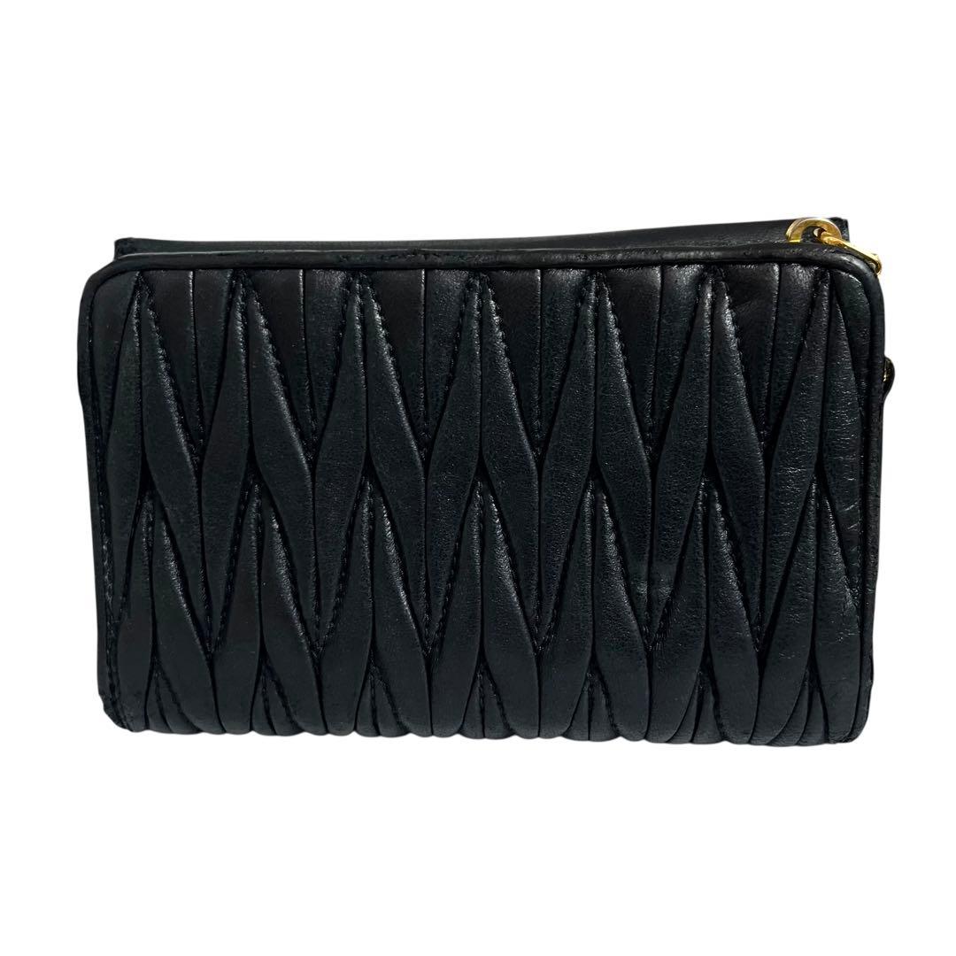 希少✨ミュウミュウ 二つ折り財布 マテラッセ ロゴ金具 レザー ブラック