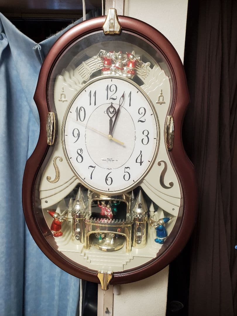 CITIZEN 電波掛け時計 回転飾り