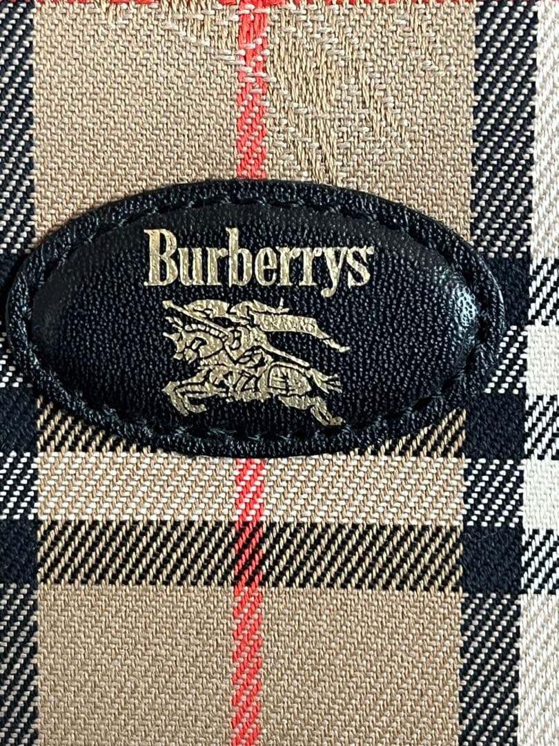 Burberry バーバリー ノバチェック 折財布 キャンバス レザー がま口