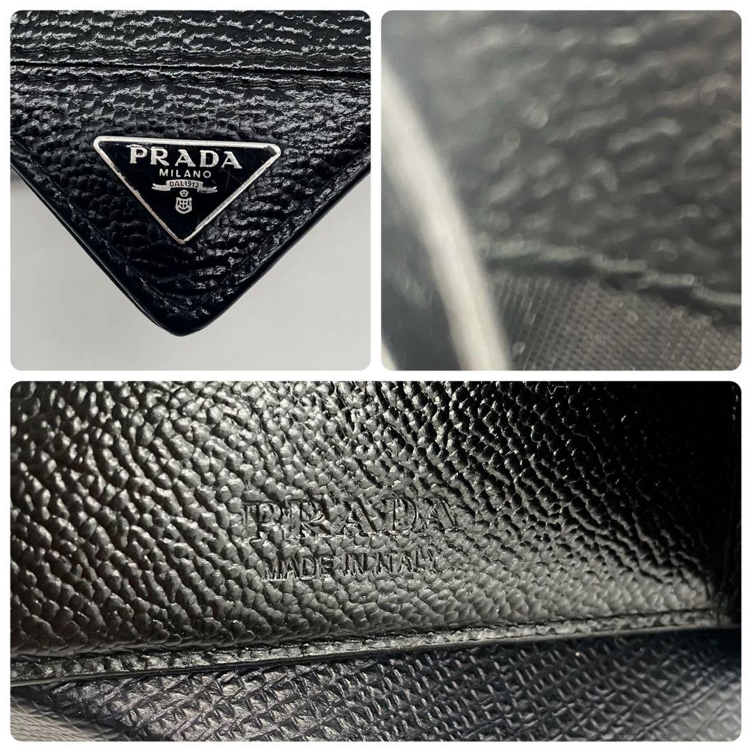 PRADA トライアングル マネークリップ 二つ 折り財布 シボ皮 レザー 黒