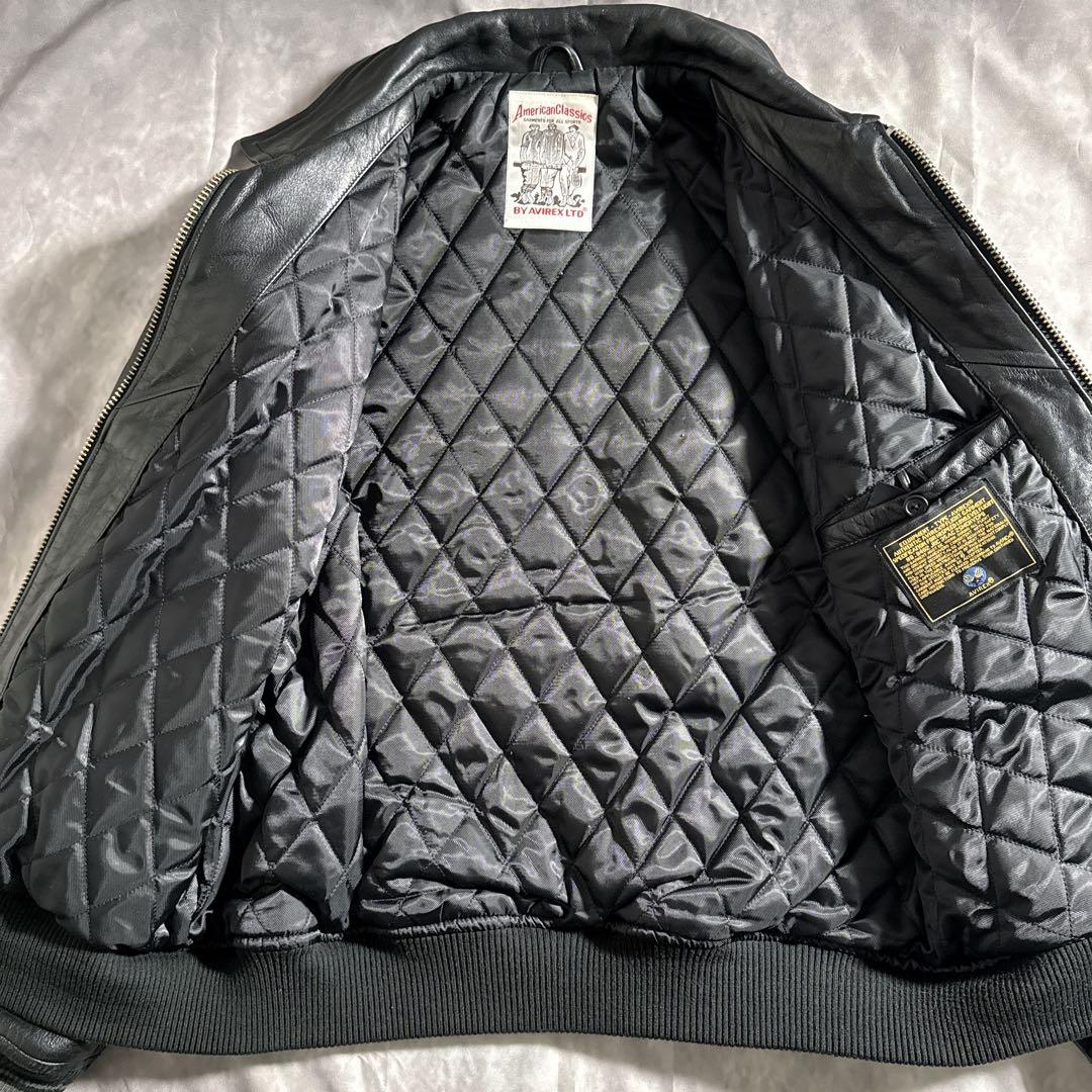 アヴィレックス　オールブラック　ヴァーシティー　レザージャケット　スタジャン　L