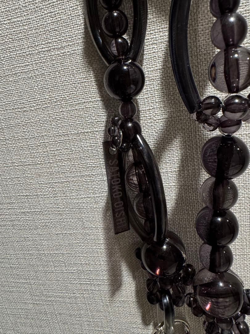 スマホアクセサリー satokooishi / strap (clear black)