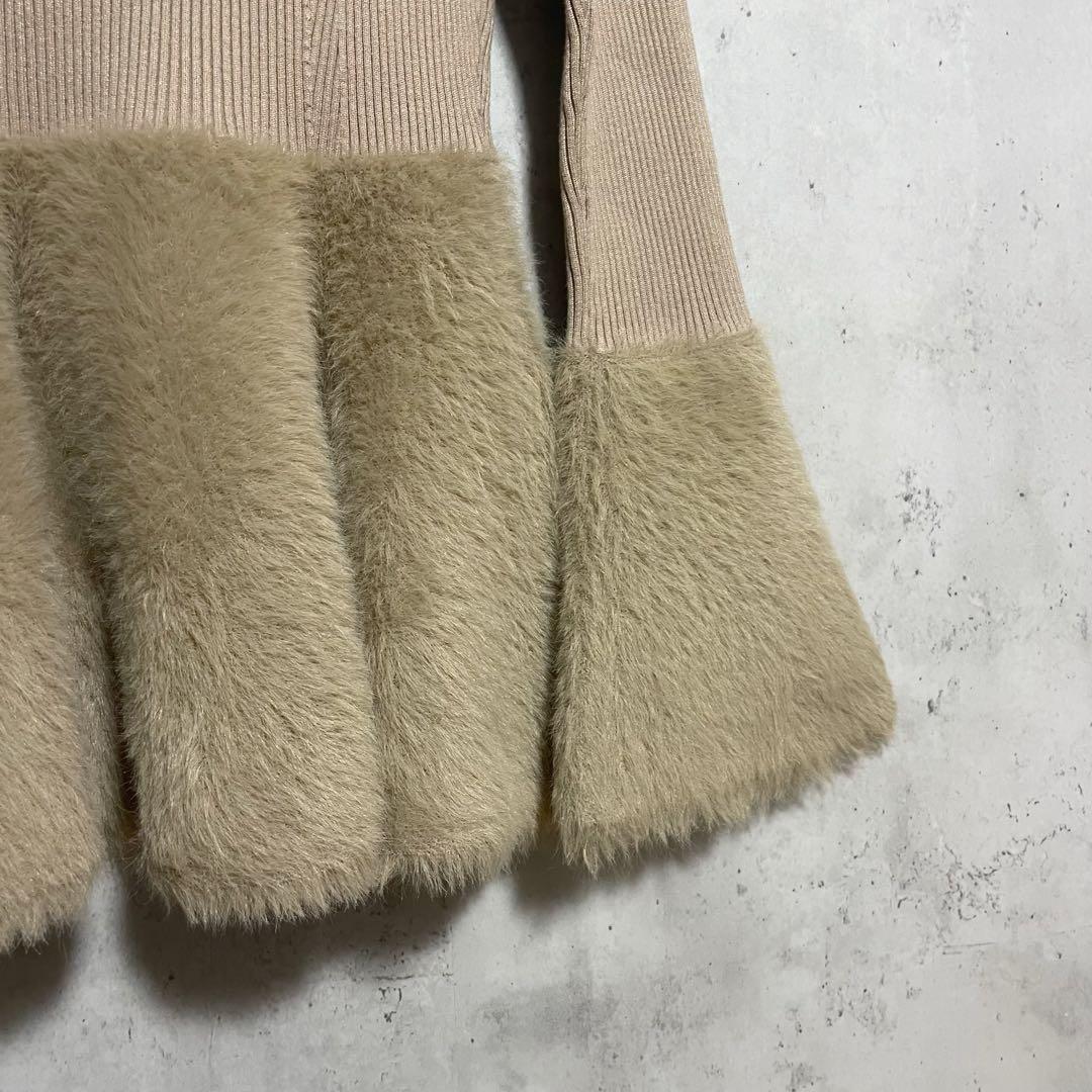 anuans アニュアンス フェザーぺプラムフレアスリーブニット