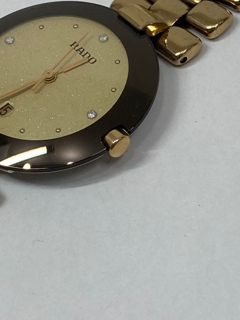 RADO ラドー　ブラック　ゴールド クォーツデイト　腕時計　稼働品