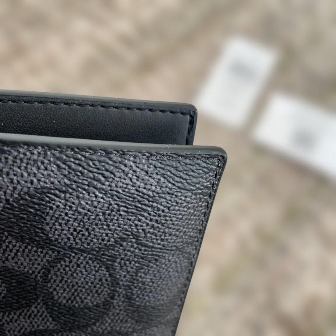 新品未使用　49,500円　COACH 二つ折り財布