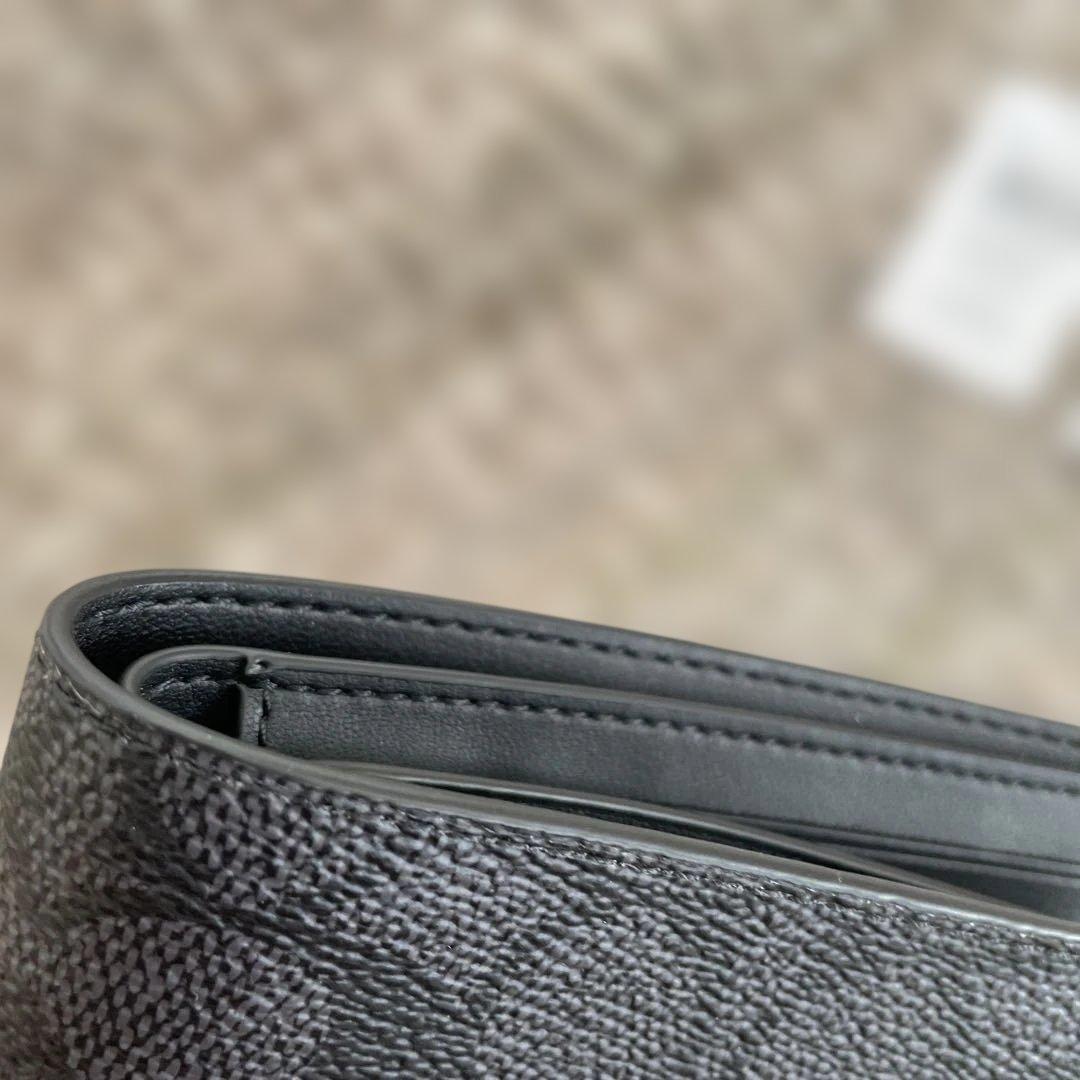 新品未使用　49,500円　COACH 二つ折り財布