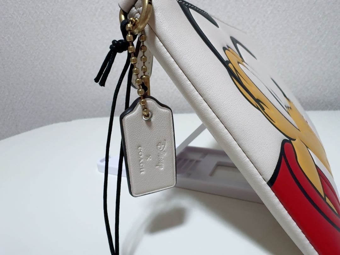 【新品・正規品】ディズニーコラボ商品 コーチ ポーチ