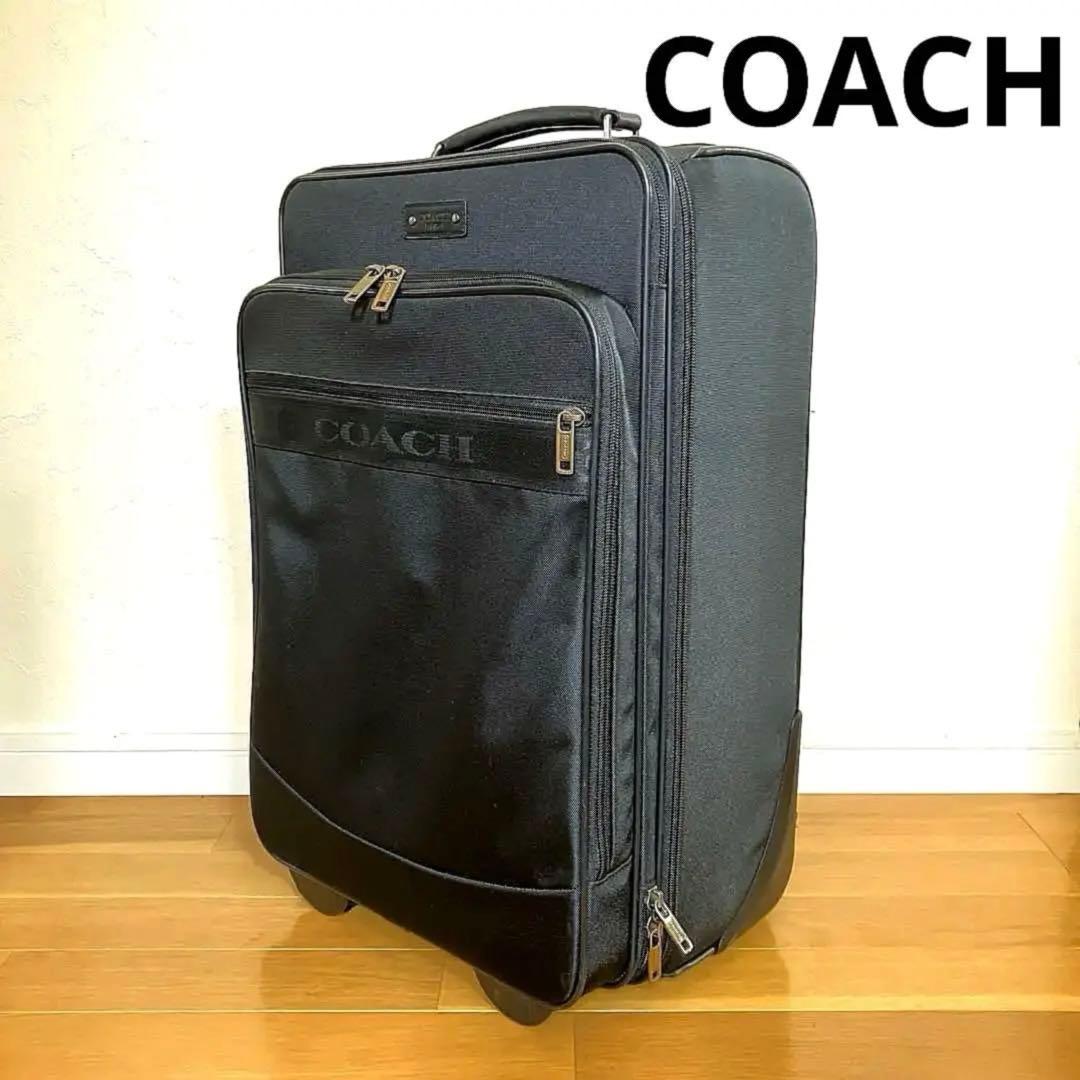 超美品COACHユニセックスキャリーケースビジネス出張用ブラックキャリーバック