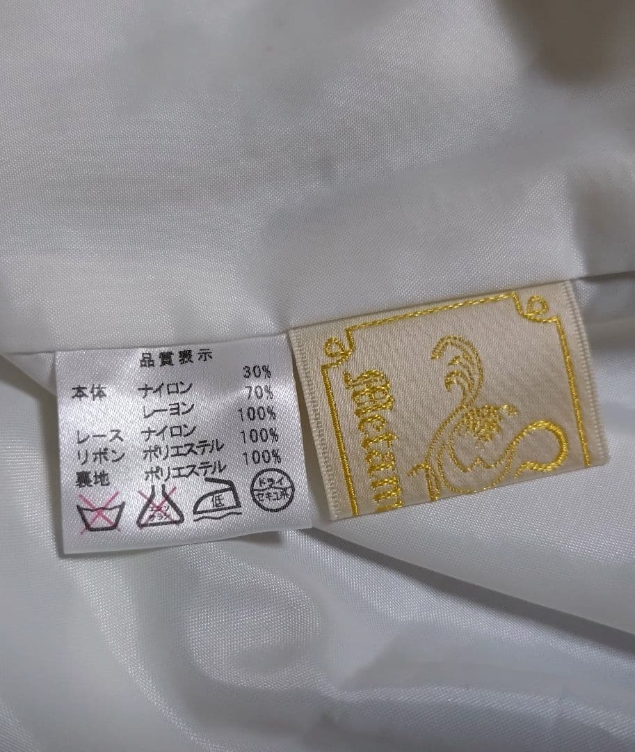 新古品 メタモルフォーゼ 総レースシャーリングJSK オフ白