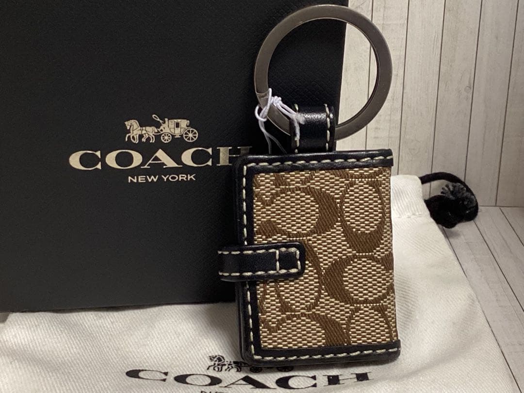 未使用タグ付きコーチCOACH ロゴ入りレザーキーホルダー写真入れ手帳本物
