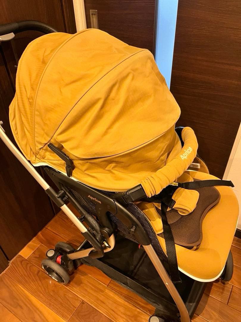 [送料無料 美品]Apricaベビーカーオプティアクッション　マスタードゴールド