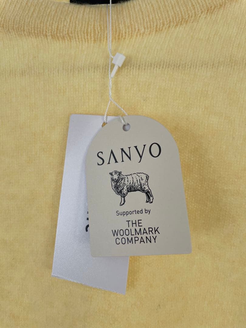 TOBECHOCイエロー ニットセーター 長袖 リボンモチーフパフスリーブ