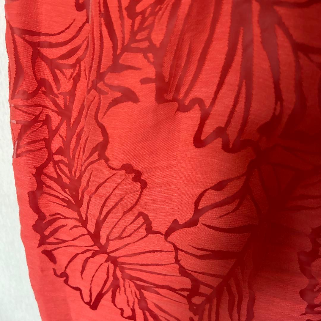 透かし織りの豪華なアンサンブルスーツ　オレンジ系