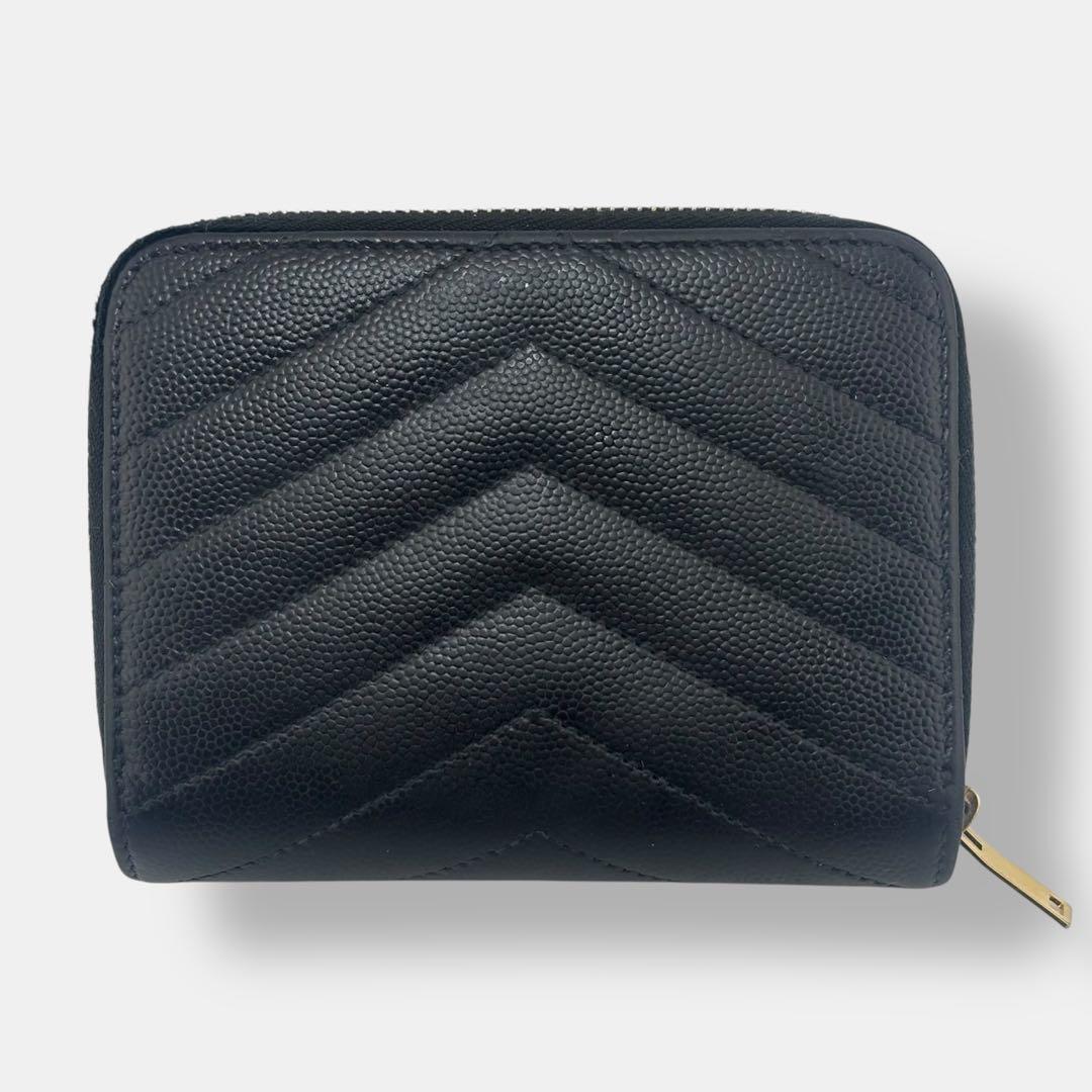 極美品 サンローラン 2つ折り財布 カサンドラ Vステッチ ロゴ金具 レザー 黒