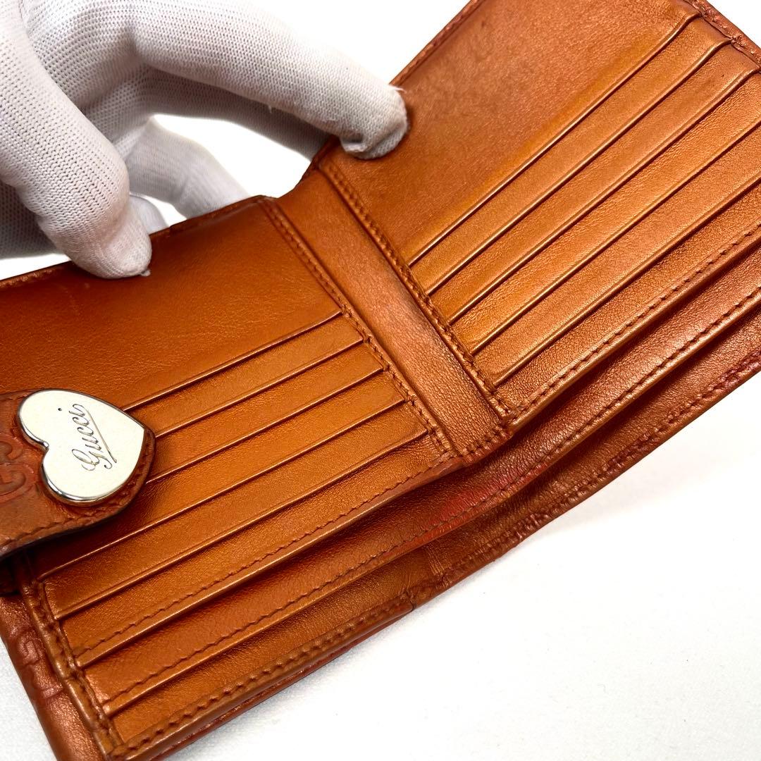 グッチ　二つ折り財布　ハートロゴプレート　GGシマレザー　型押しエンボス　美品