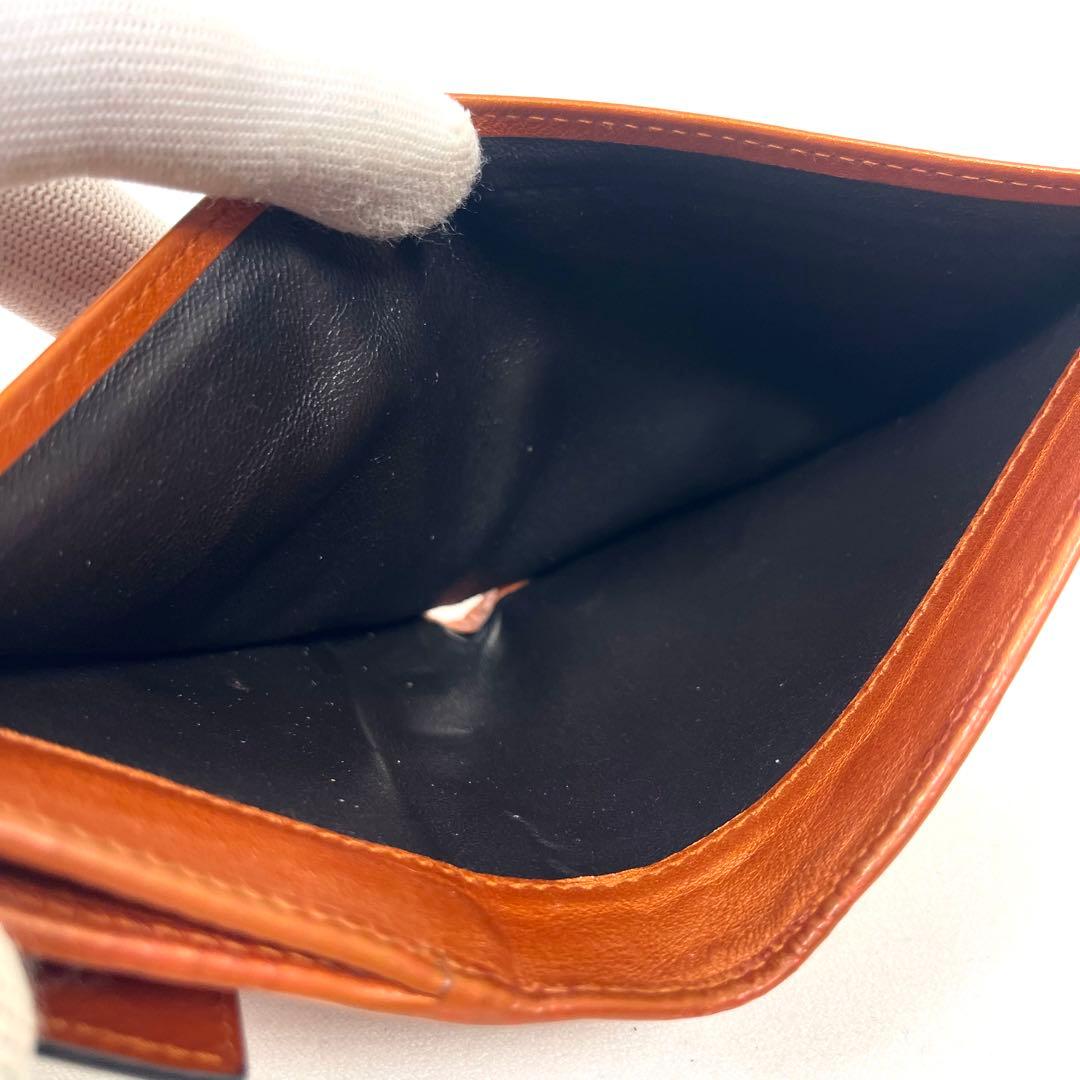 グッチ　二つ折り財布　ハートロゴプレート　GGシマレザー　型押しエンボス　美品