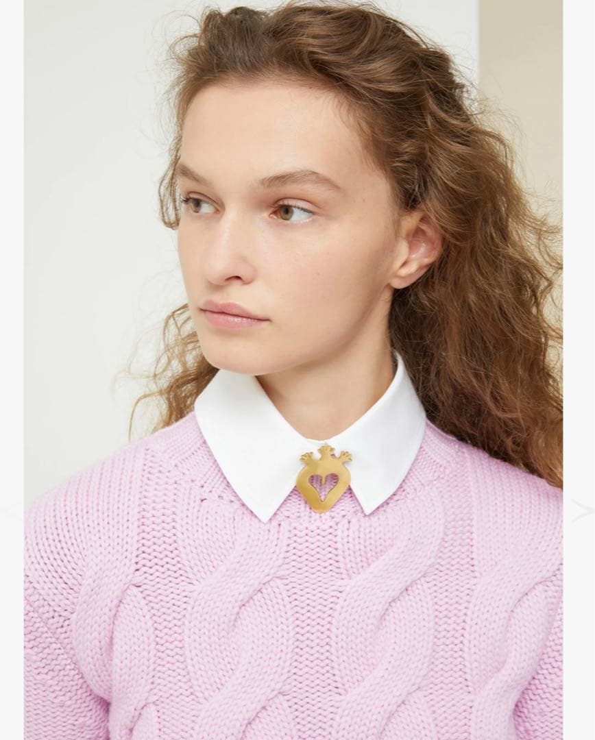 ケーブル編みピンク長袖ニットセーター