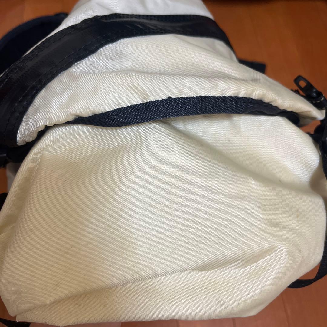 アンドワンダー　ショルダーバッグ メッセンジャーバッグ アイボリー/ブラック