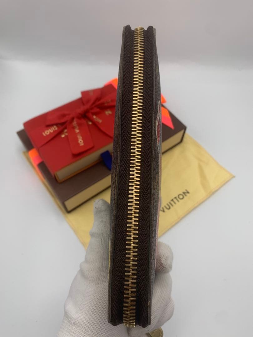 ルイヴィトン モノグラム ステッカー ジッピーウォレットコクリコ 長財布 P55