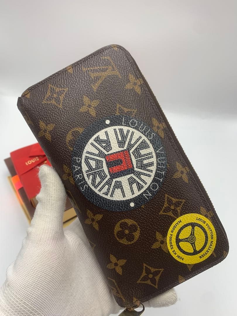 ルイヴィトン モノグラム ステッカー ジッピーウォレットコクリコ 長財布 P55