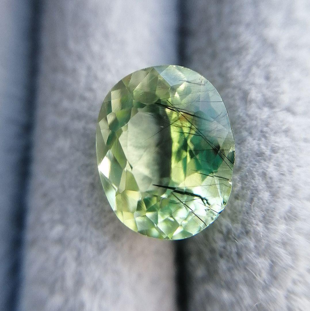 ルチルペリドット(ルドウィジャイトインペリドット)