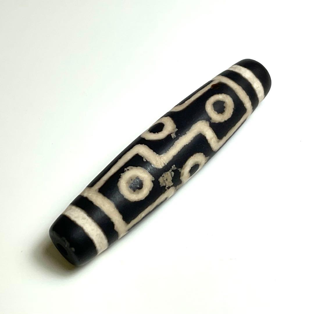 黒九眼観音立像天珠