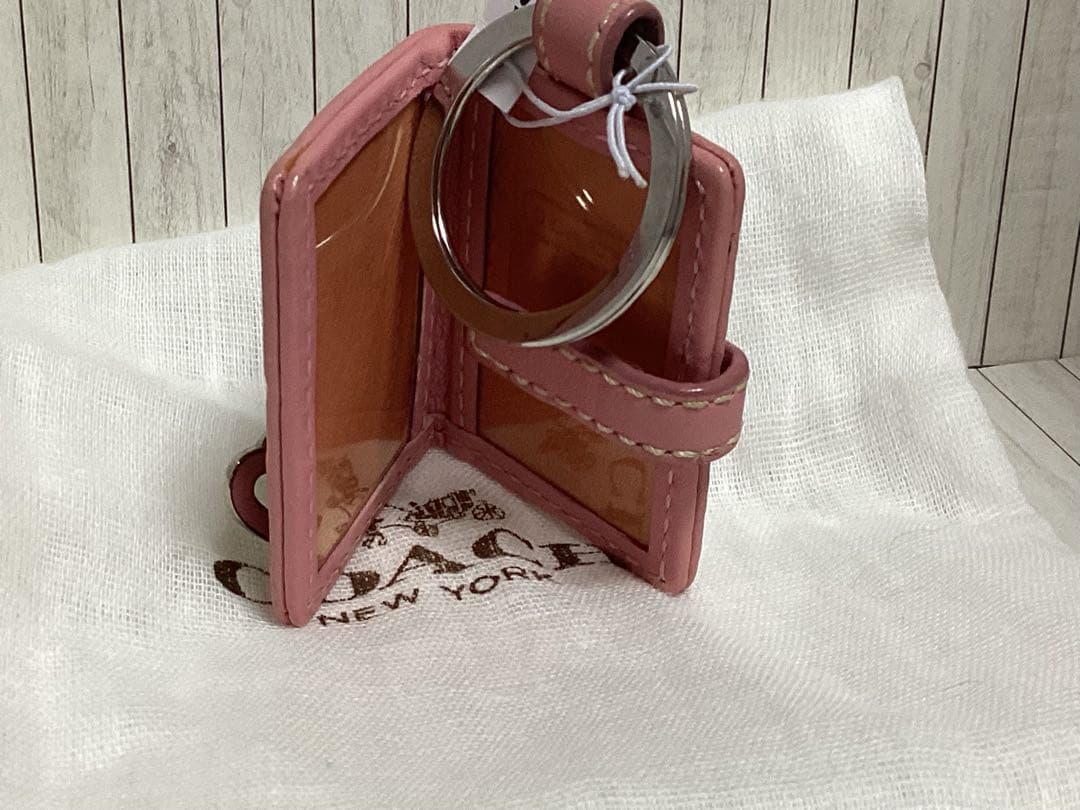 タグ保存袋付き未使用コーチCOACH キーホルダーピンクハート型本物写真入手帳型