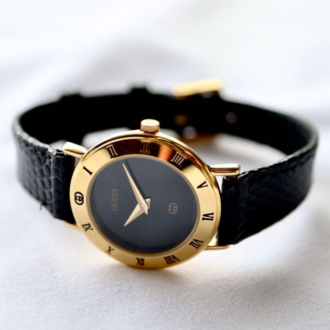 GUCCI ローマンベゼル ブラック文字盤 ゴールド レディース腕時計 1375