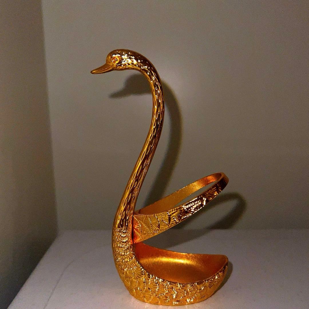 黄金の白鳥 スプーンなどをたてるものです。