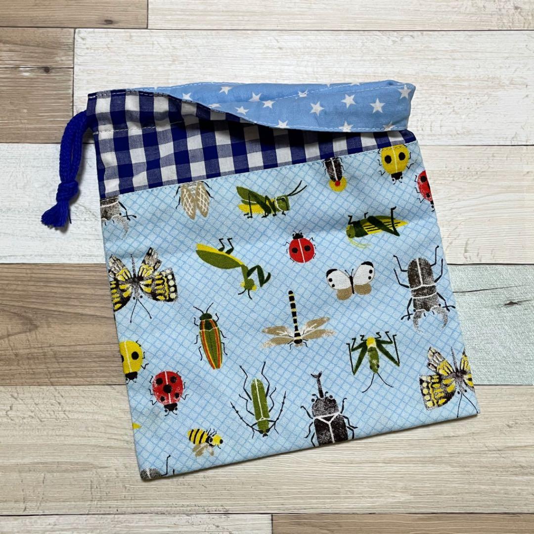 ハンドメイド★サックス。昆虫プリント×チェック切替片側紐出し巾着。入園グッズ