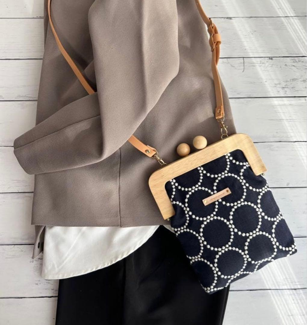 【1085】フォロワー600人突破感謝特別割引ミナペルホネンタンバリン木製がま口