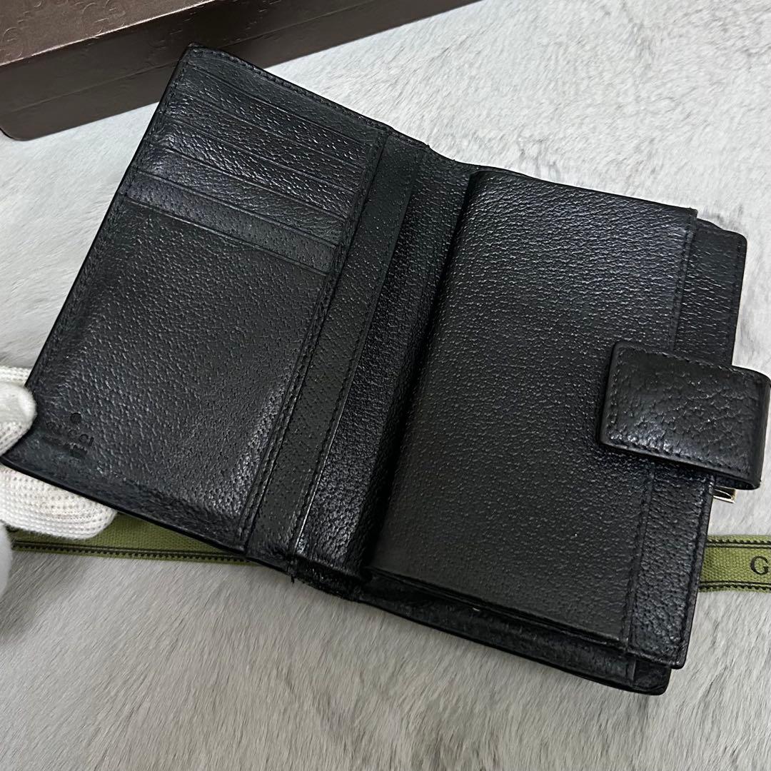 GUCCI グッチ　折り財布　ガマ口　メタルロゴ　キャンバス　GG ブラック