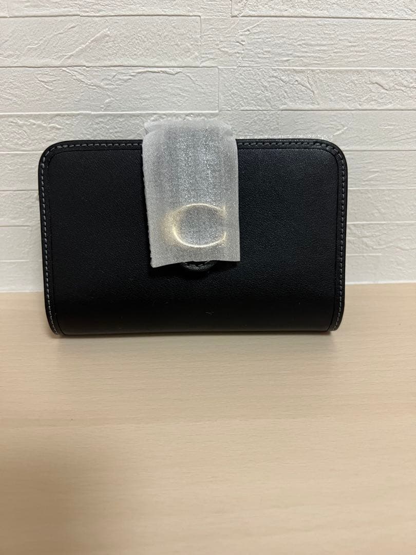 《新品》コーチ　タビー　ミディアムウォレット 二つ折り財布 金色バックル