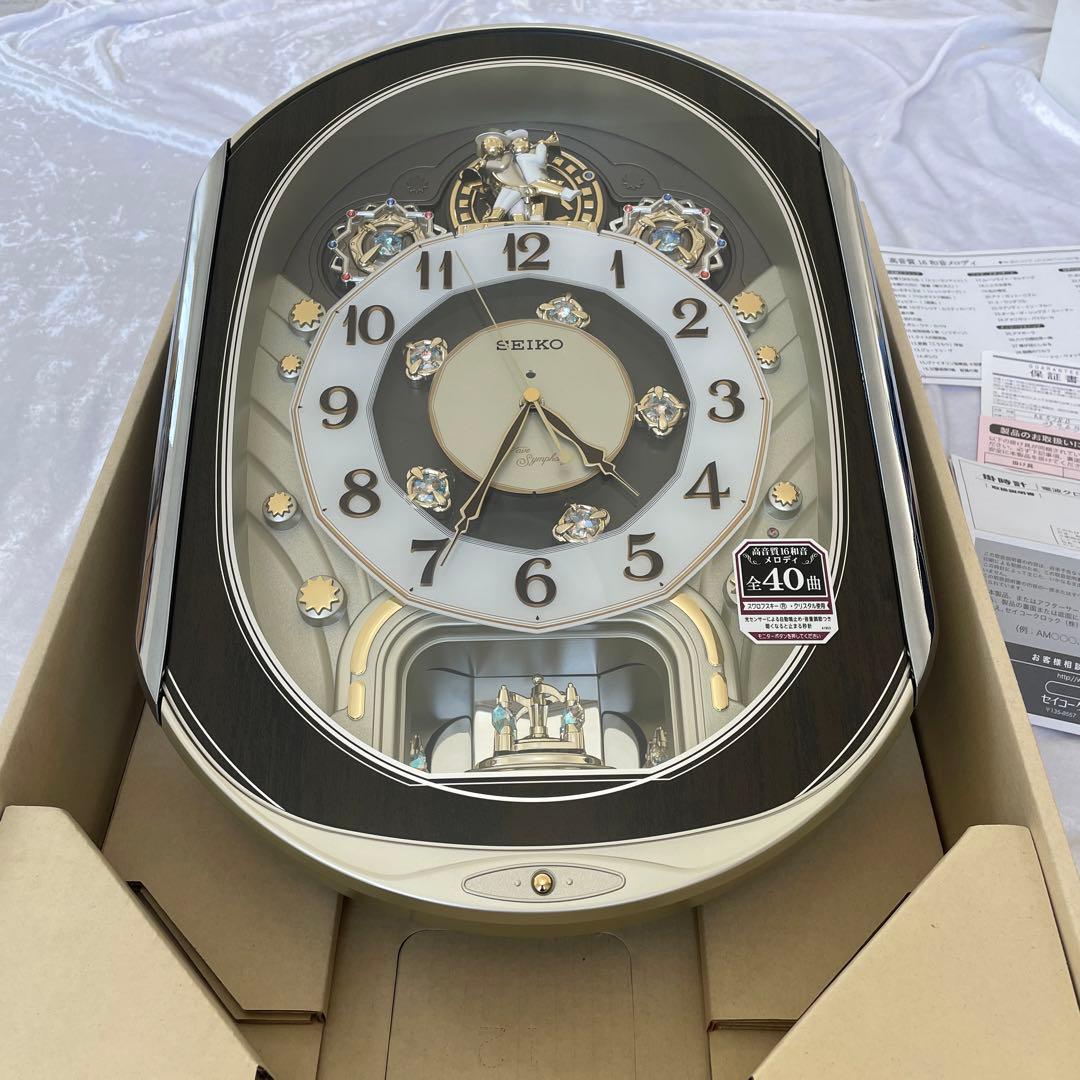 相談中箱付きセイコーSEIKO 掛時計 音楽機能付き電波クロック　スワロフスキー