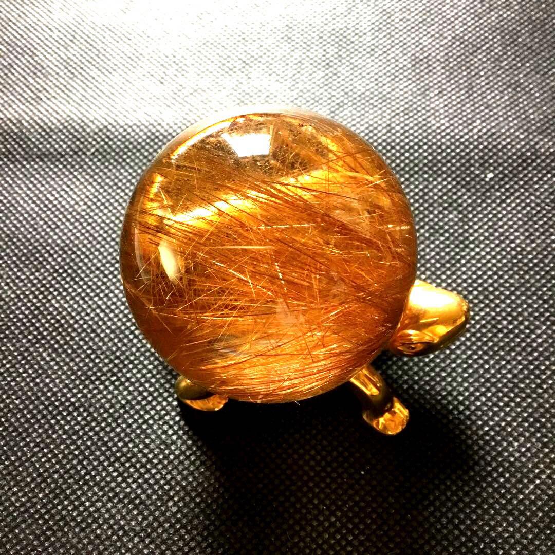 ゴールドルチルクォーツ置物　丸玉　ブラジル産　直経約4.83cm 重さ約160g
