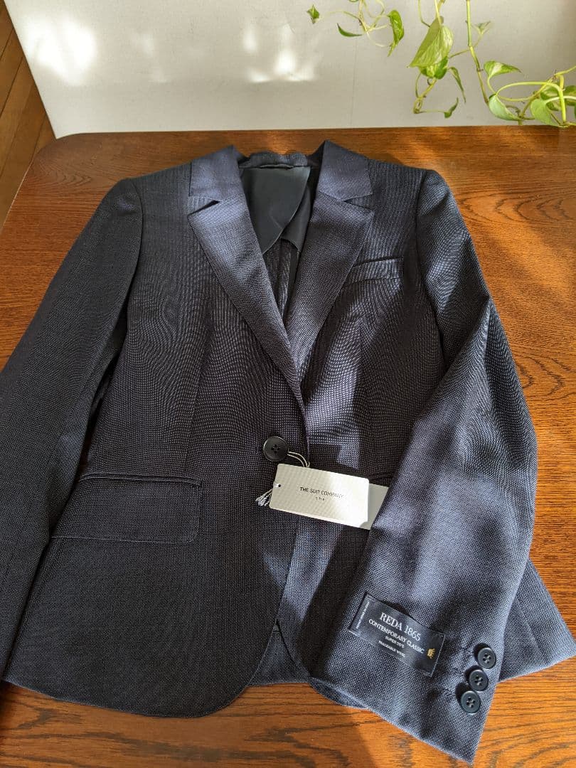 タグ付新品未使用ネイビービジネススーツ