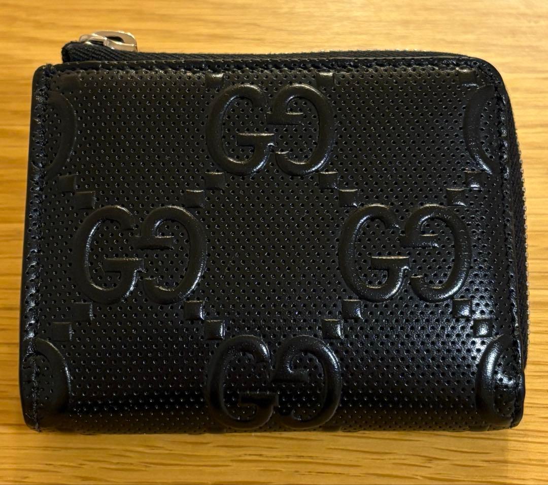 グッチ GUCCI ラウンドファスナー 財布 GG Emboss ブラック